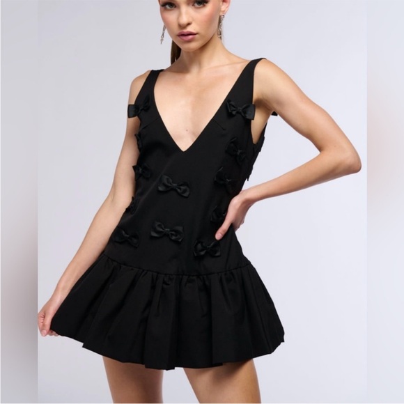AKIRA Dresses & Skirts - Elegant Black Bow-Embellished Dress